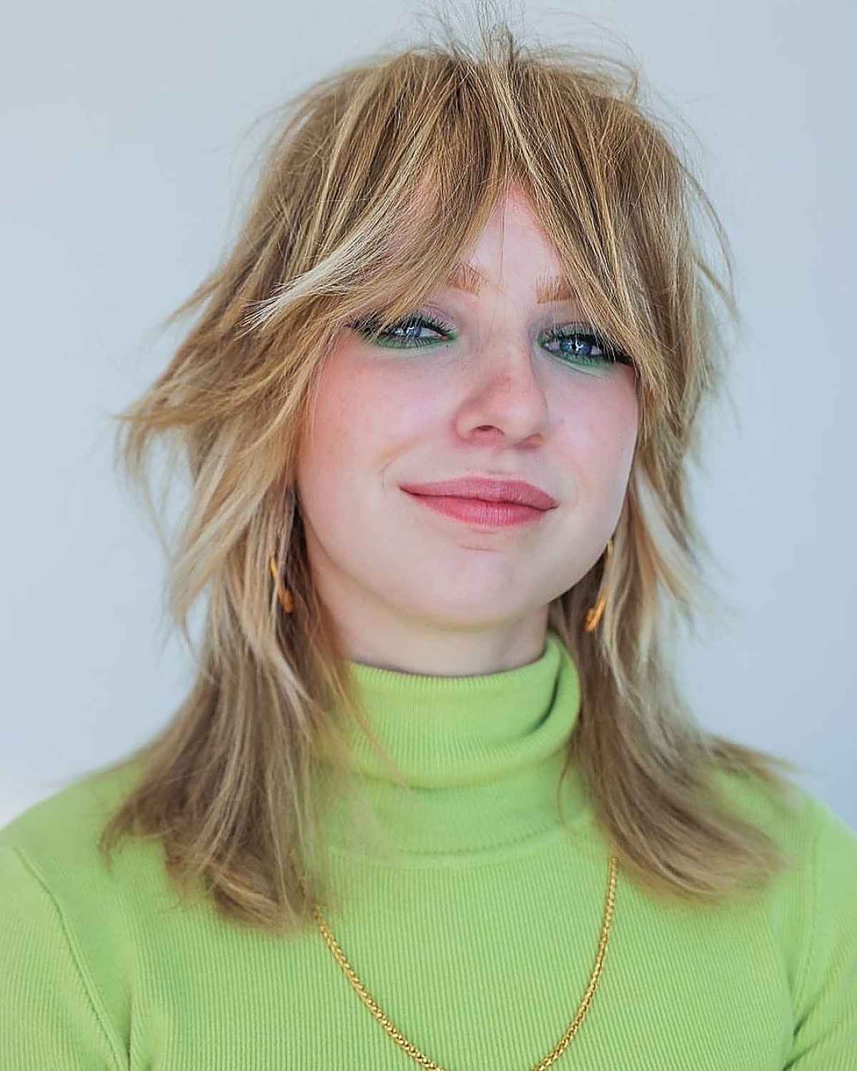 Mid-Length Shaggy Chop with Bangs