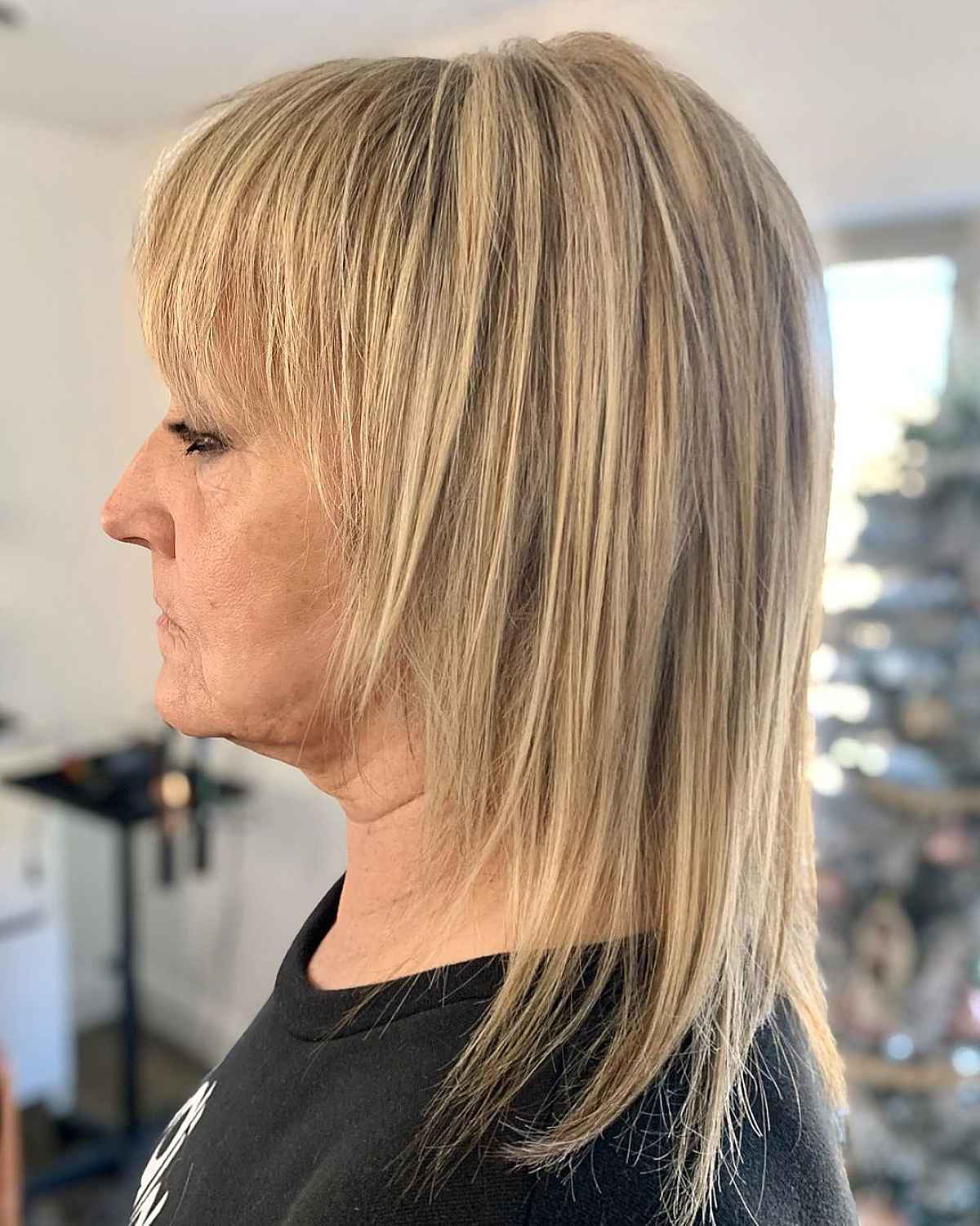 Mid-Length Straight Shag with Choppy Bangs for Women Over 60