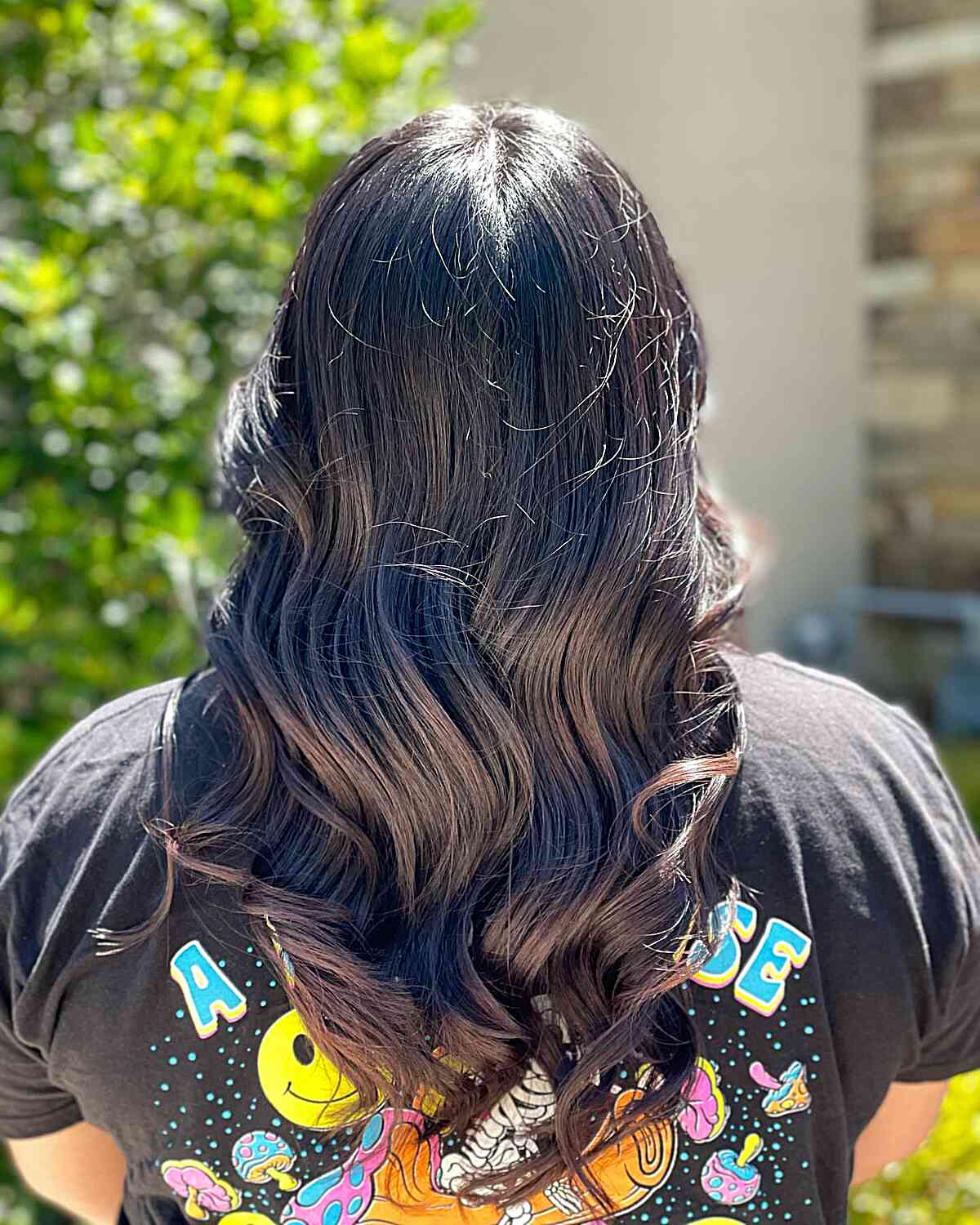 Mid-Length V Haircut with Bumped Ends and Soft Waves for Dense Tresses