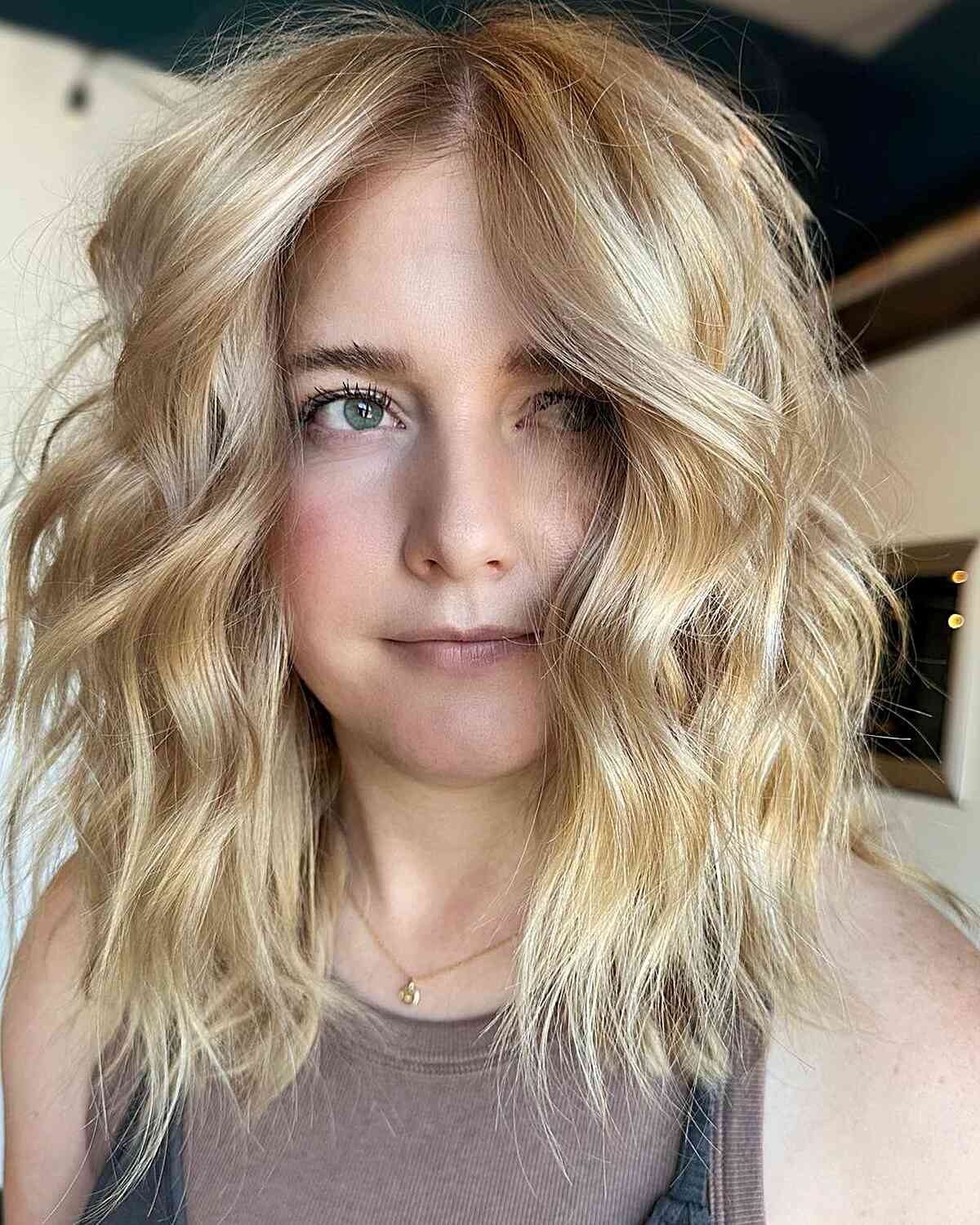 Mid-Length Warmer Blonde Choppy Hair for girls with messy hair