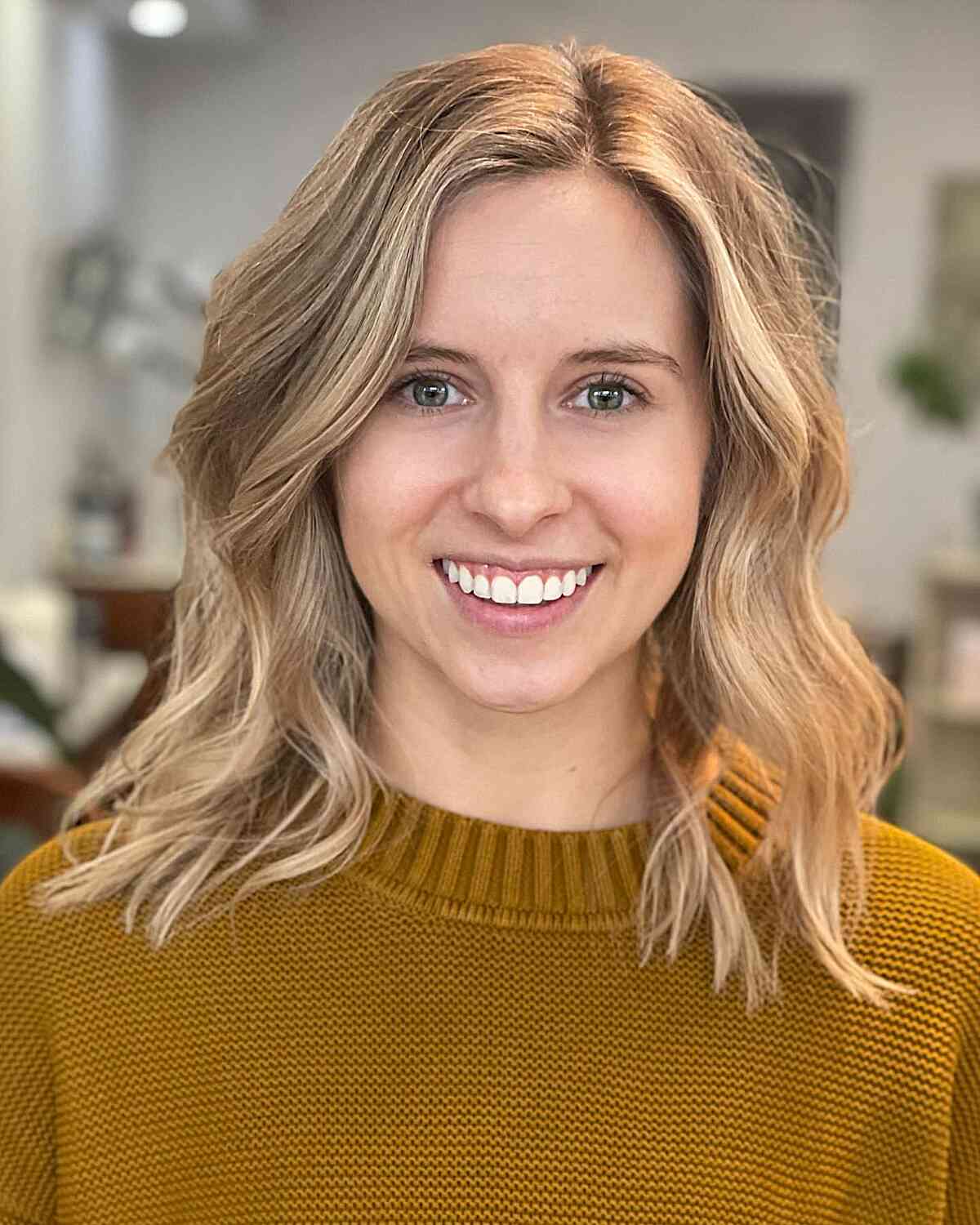 Mid-Length Wavy Blonde Hair with Layers for Fine Hair Types