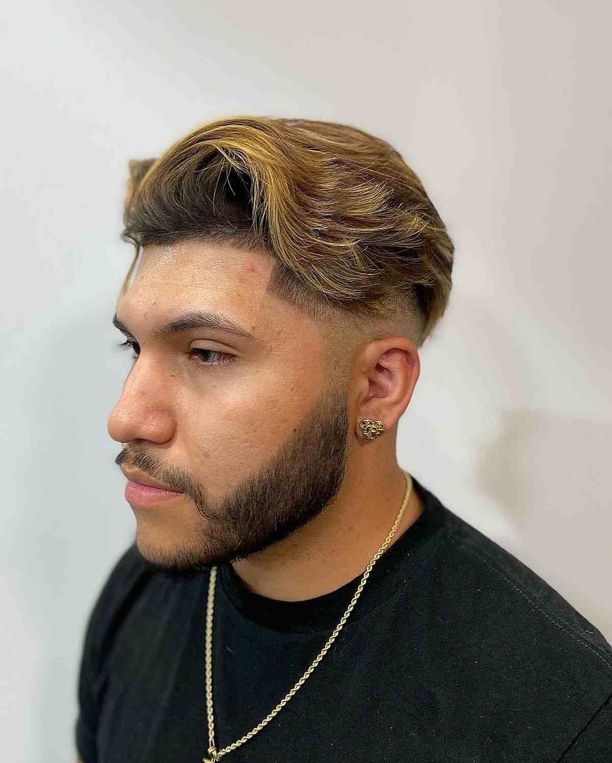 Mid Taper Fade with Blonde Waves for Men