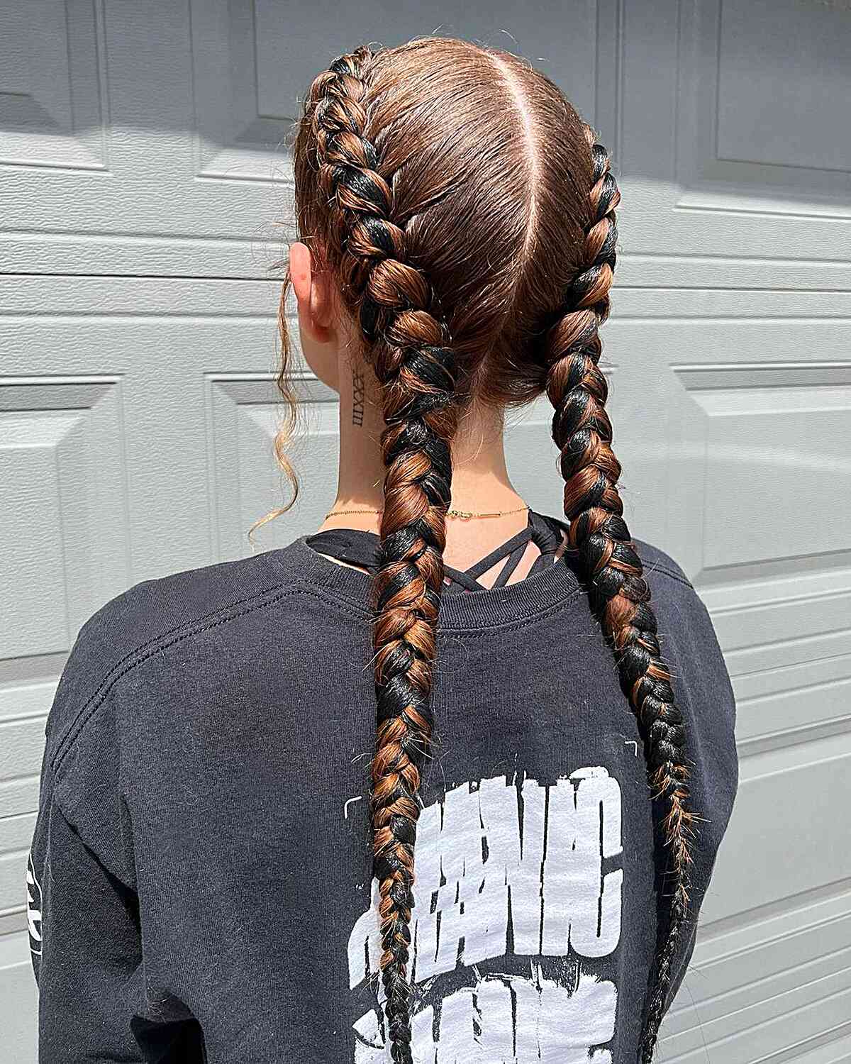 Long Middle Part Braids with Black and Brown Strands for volleyball girls