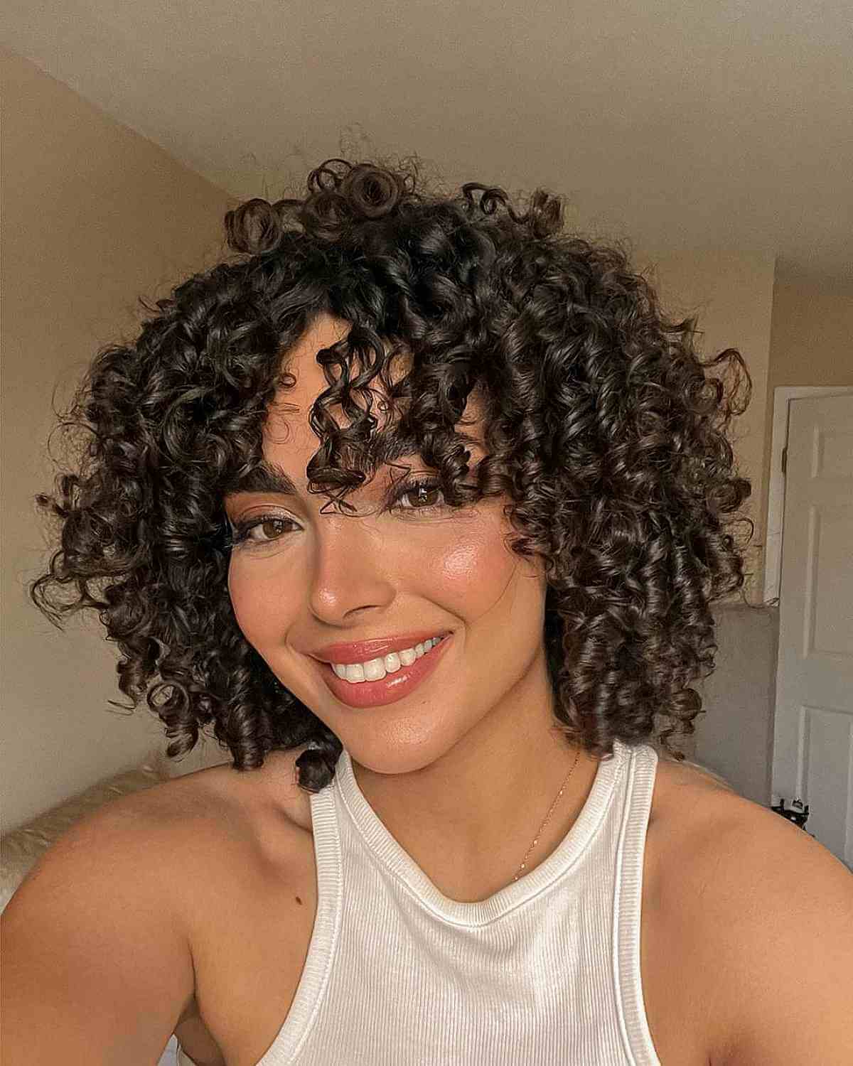 Middle Part Chin-Length Bob with Defined Curls