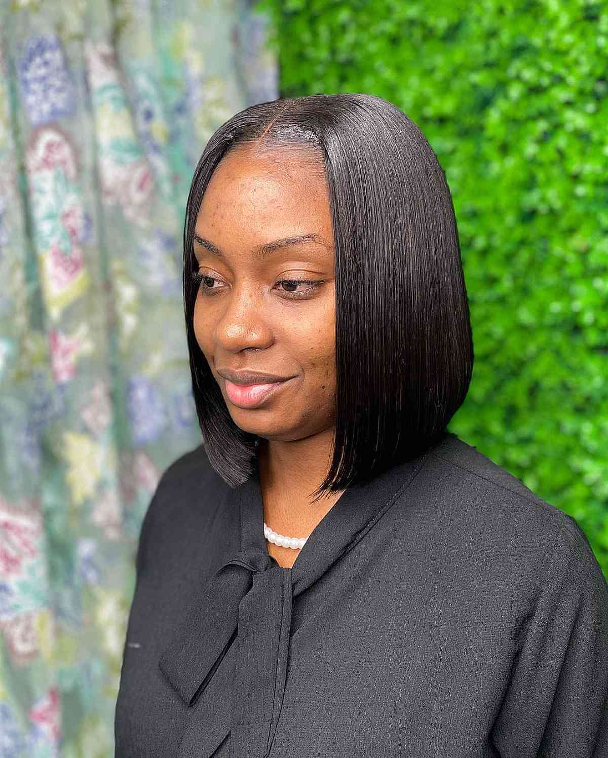 Middle part sew-in bob hairstyle