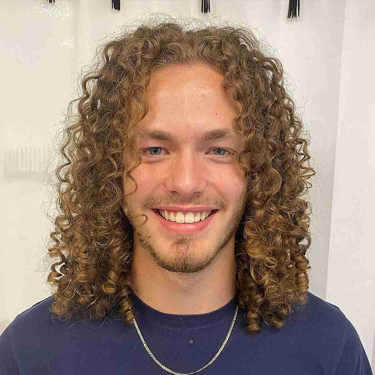 Middle Part Style on Long Blonde Curls for Men