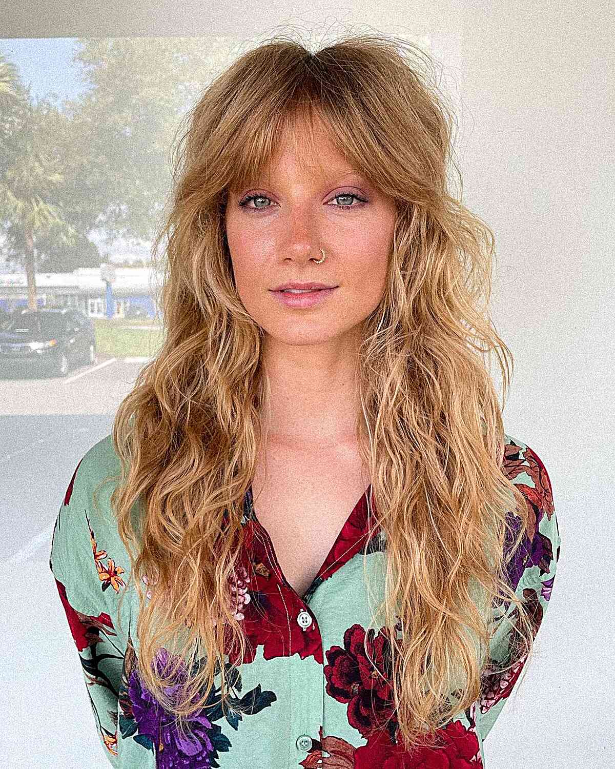Middle-Parted Bangs and Long Messy Layered Beach Waves for Square Faces