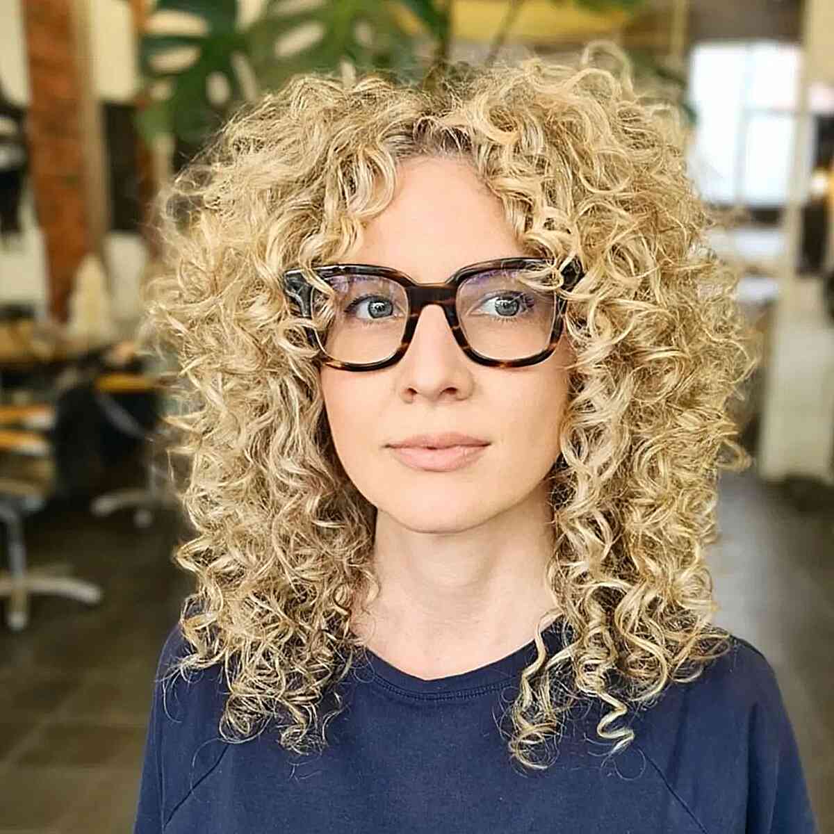 Middle-Parted Blonde Spirals for Medium Hair and Women with Glasses