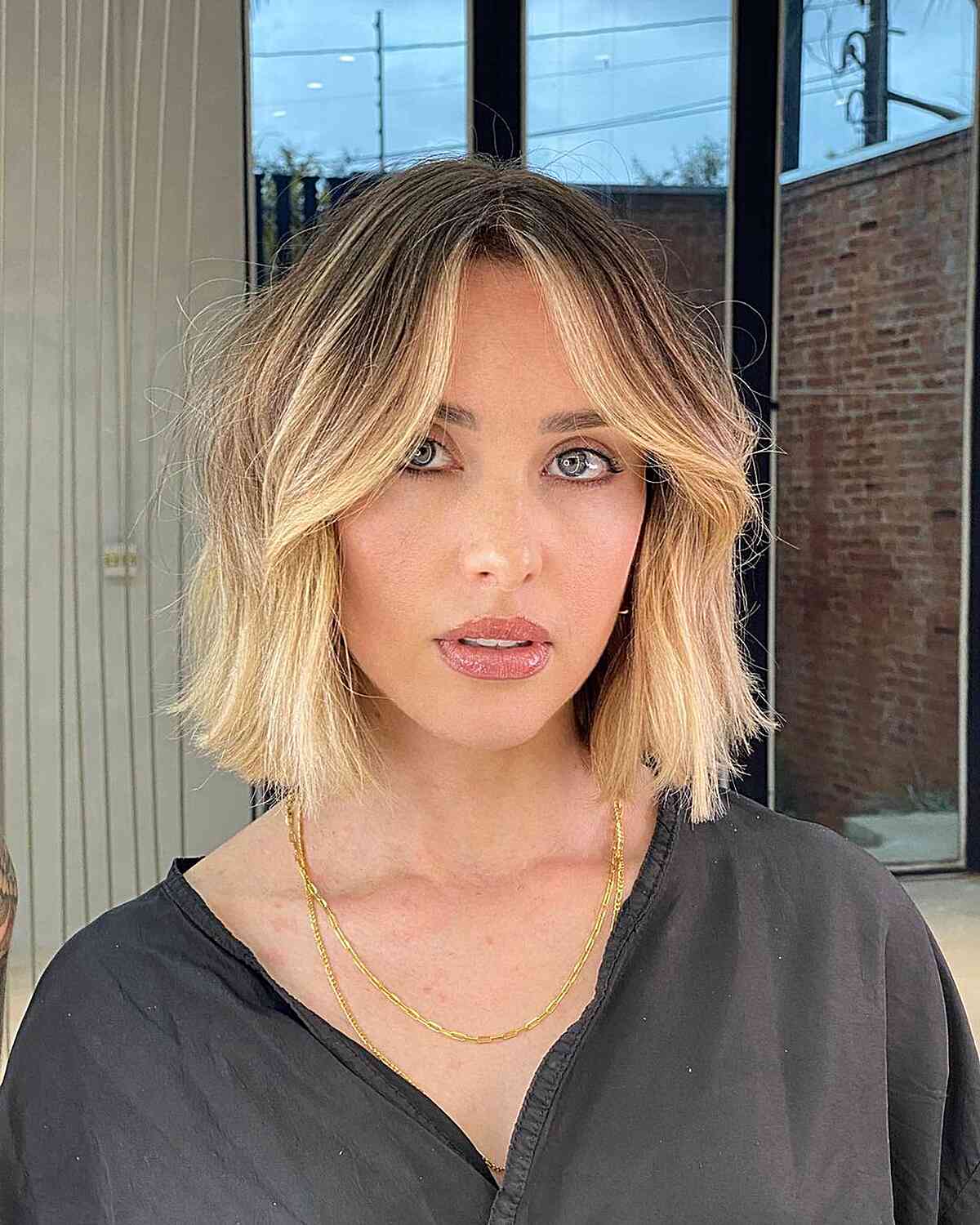 Middle-Parted Blunt Cut with Curtain Fringe and balayage