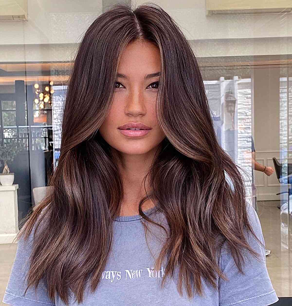 Middle-Parted Caramel Beige Balayage on women with medium to long length hair