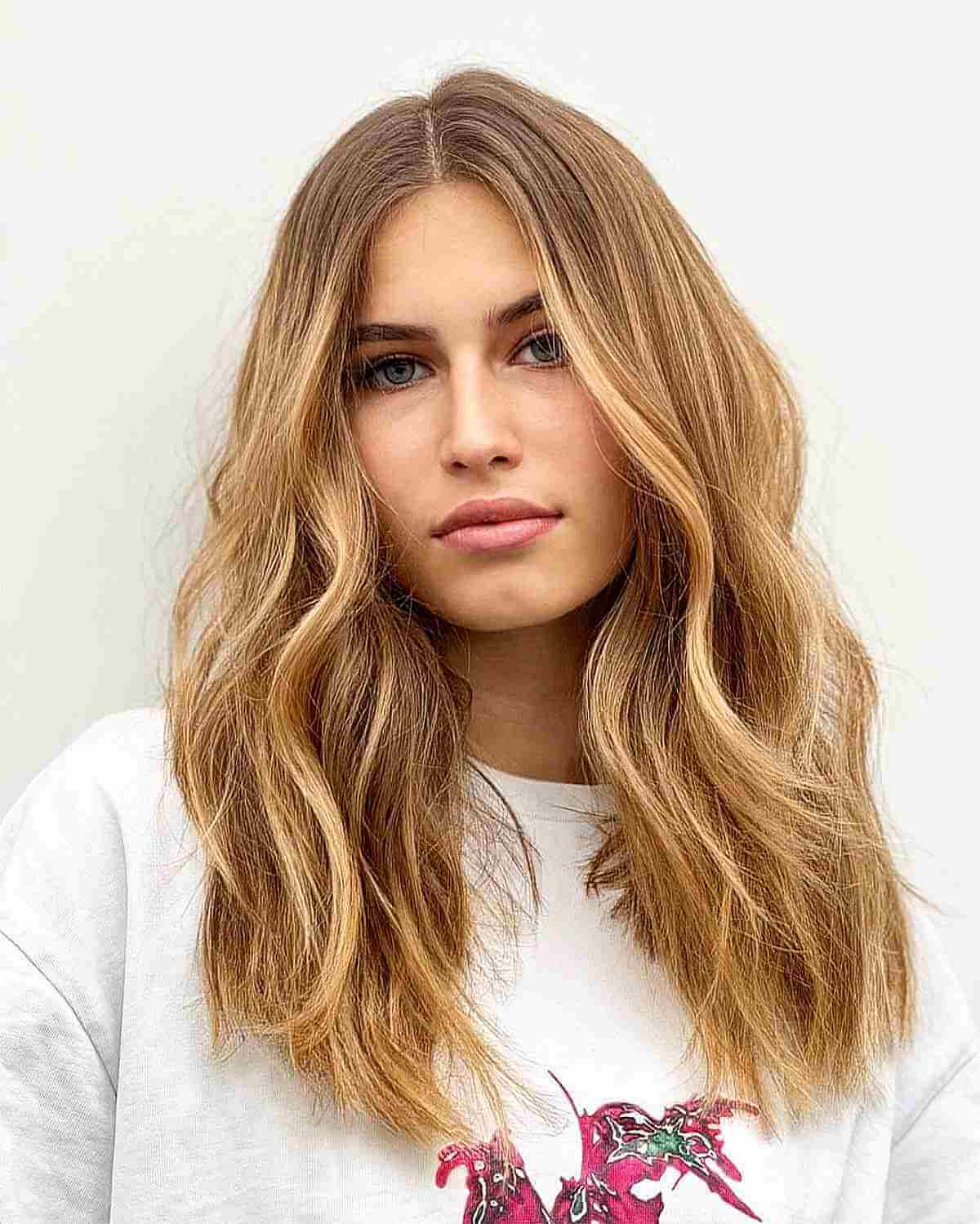 Middle-Parted Tousled Dark Blonde Mid-Length Hair