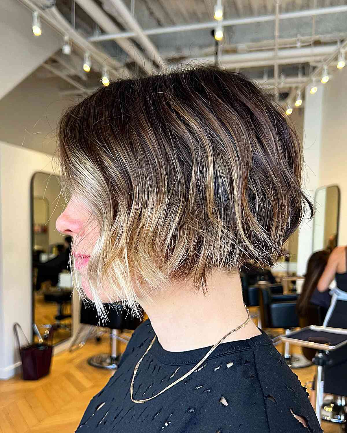 Chin-Length Mini Brown Textured Bob with Face-Framing Highlights