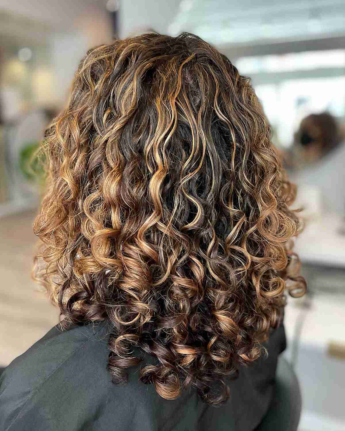Mocha Caramel Balayage Swirls on Brunette Curls