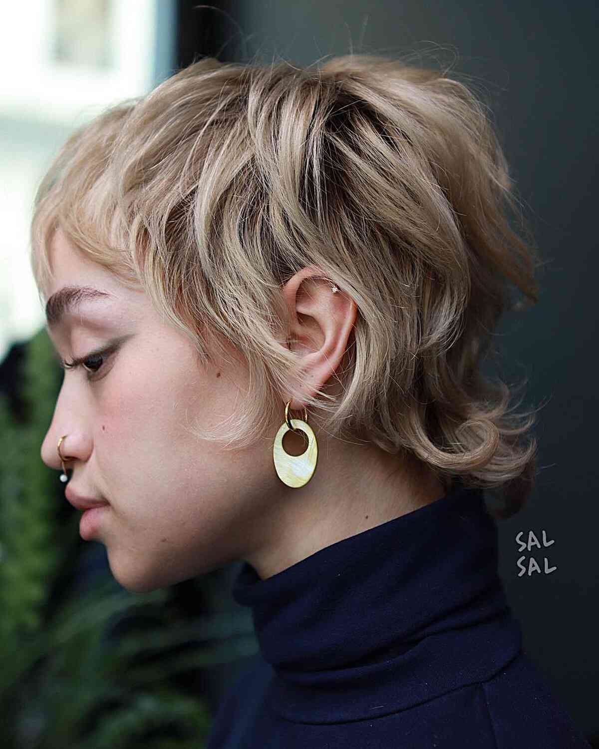 Mod-Inspired Long Pixie with Fringe for blondes with flipped out ends