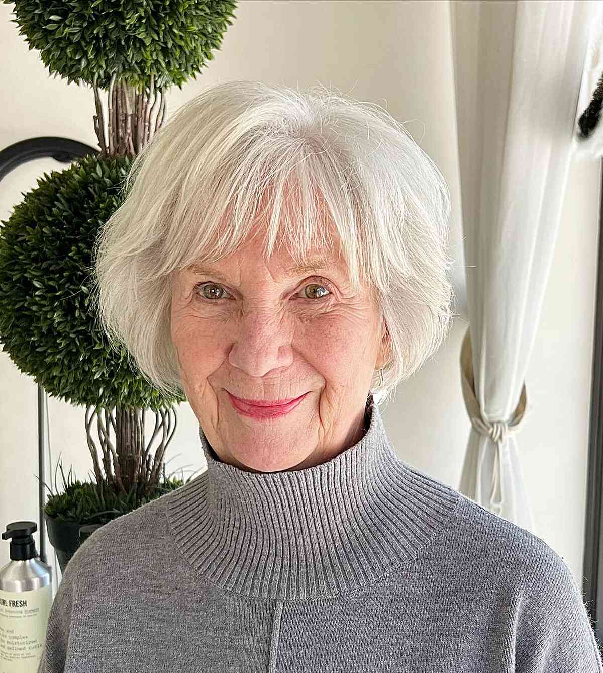 Modern and Classic Bob with Bangs and Layers for senior ladies with white hair