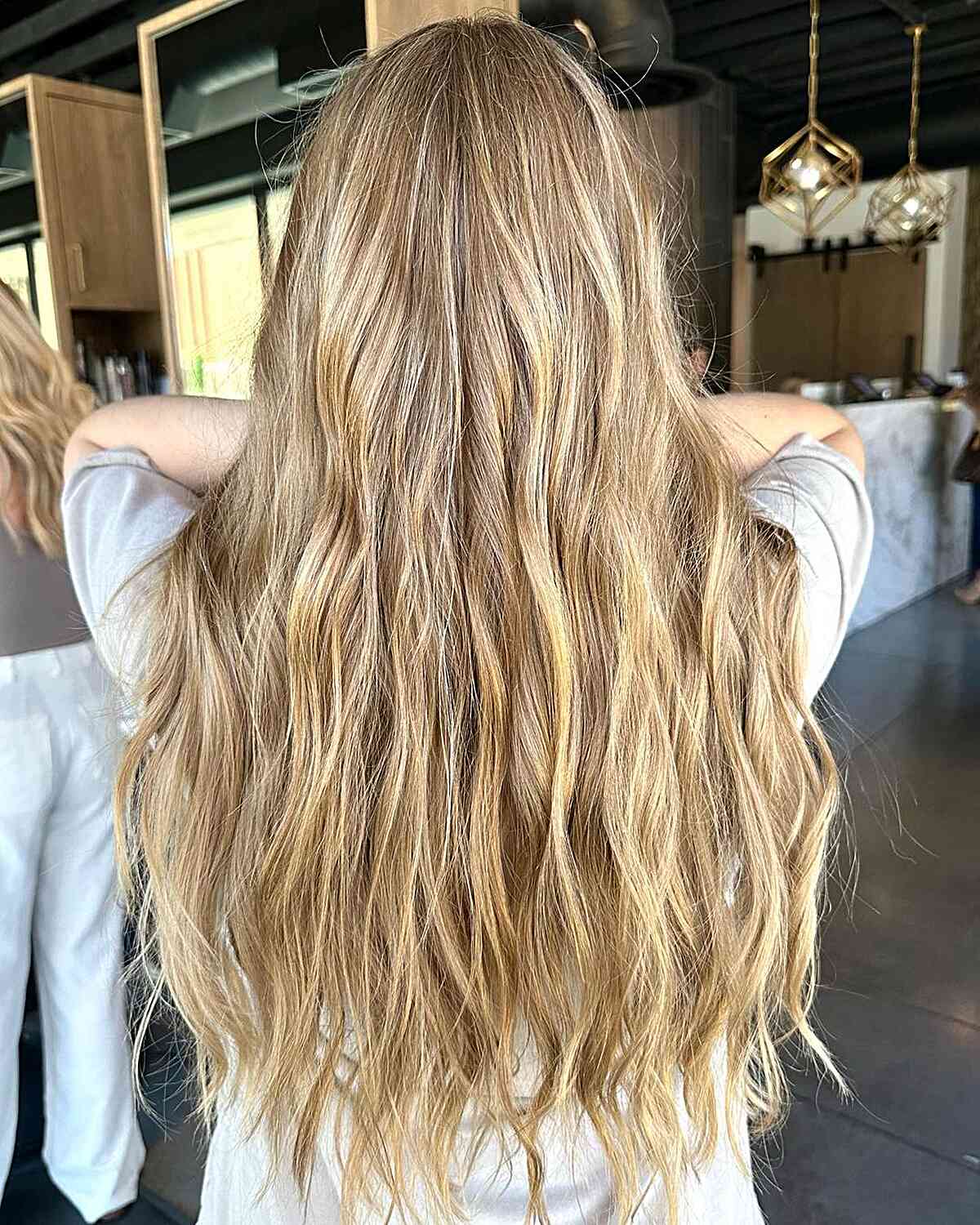 Modern Bronde Color and Long-Length Mermaid Haircut