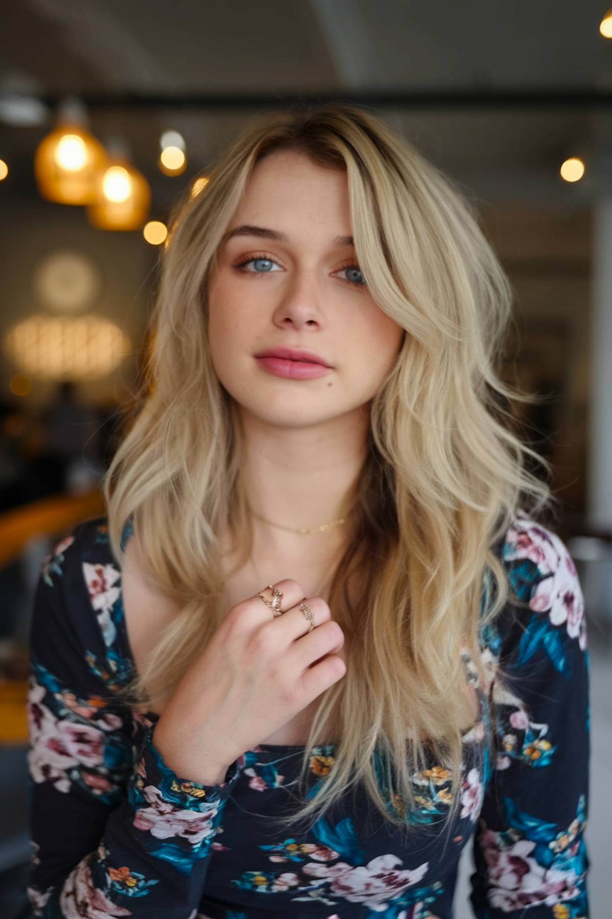 Long layered shag hairstyle with side part and choppy layers