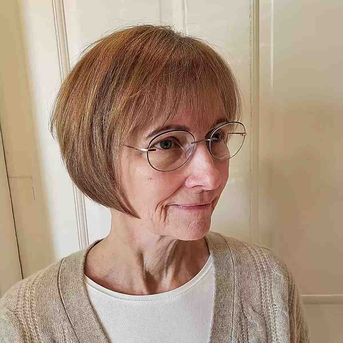 Modern See-Through Fringe Bangs on a cute bob cut for older women