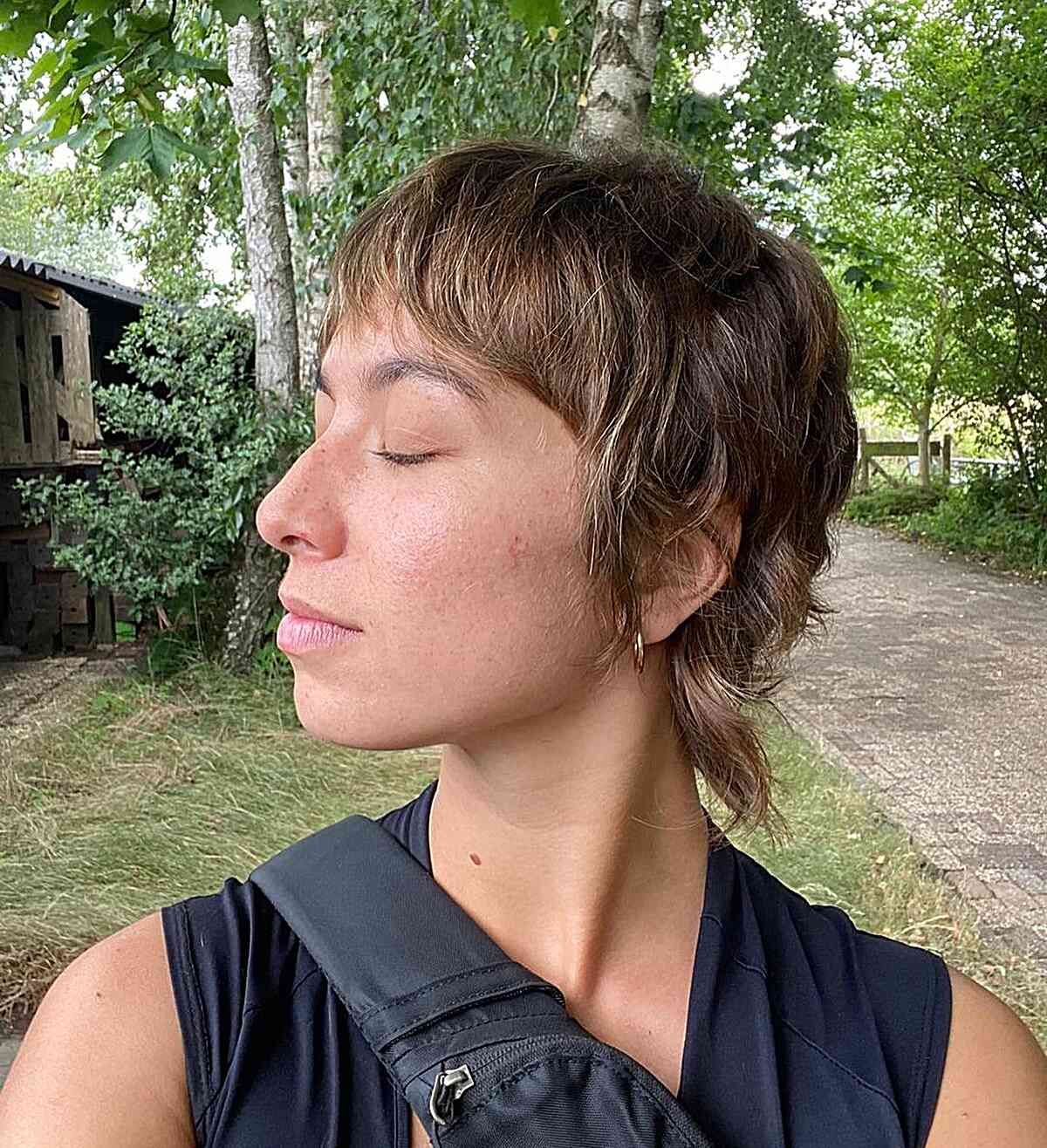 Modern Short Long Shaggy Pixie Mullet with Thin Bangs