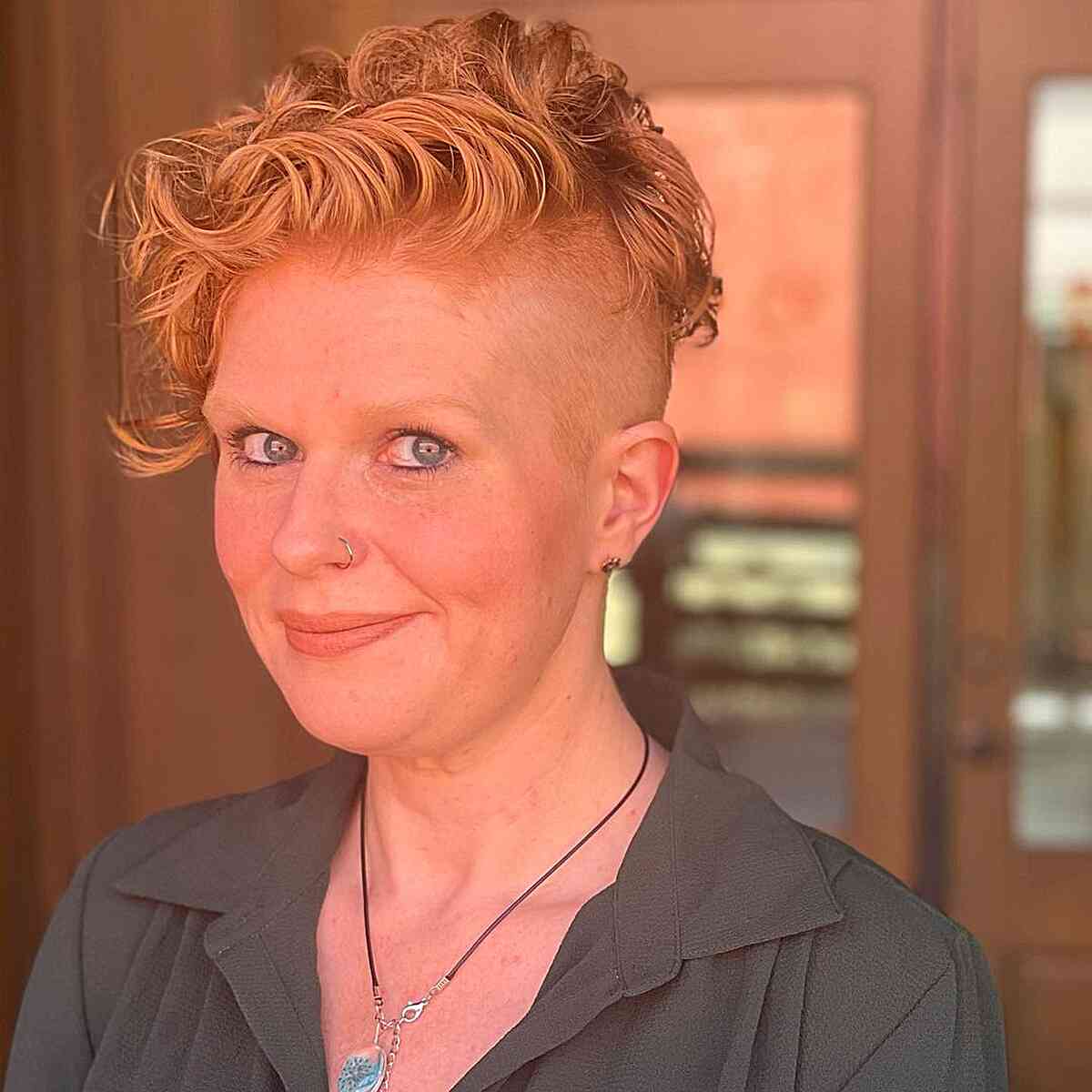 Modern Undercut Mohawk for Older Women with natural curly hair