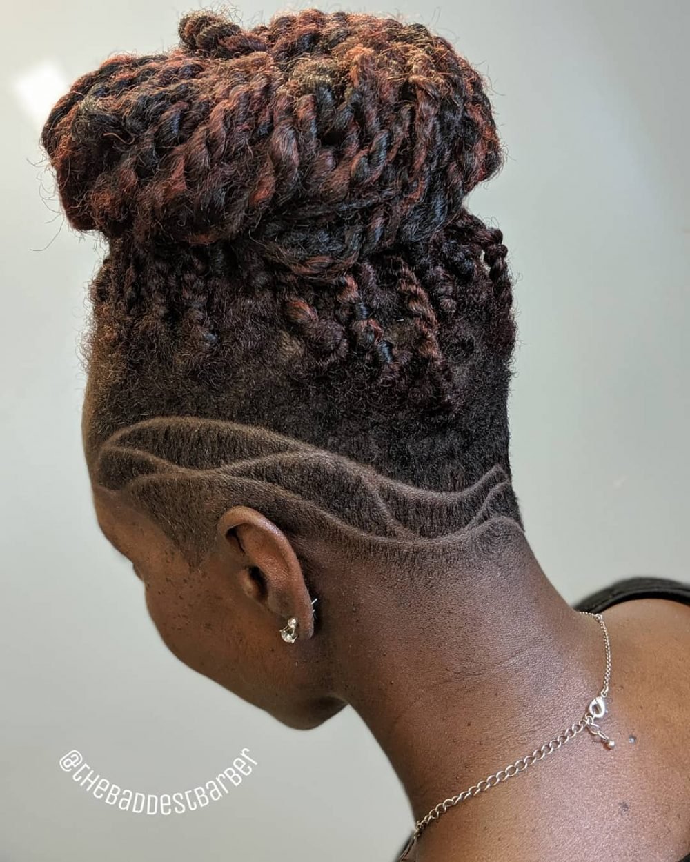 mohawk braid top knot for a black woman