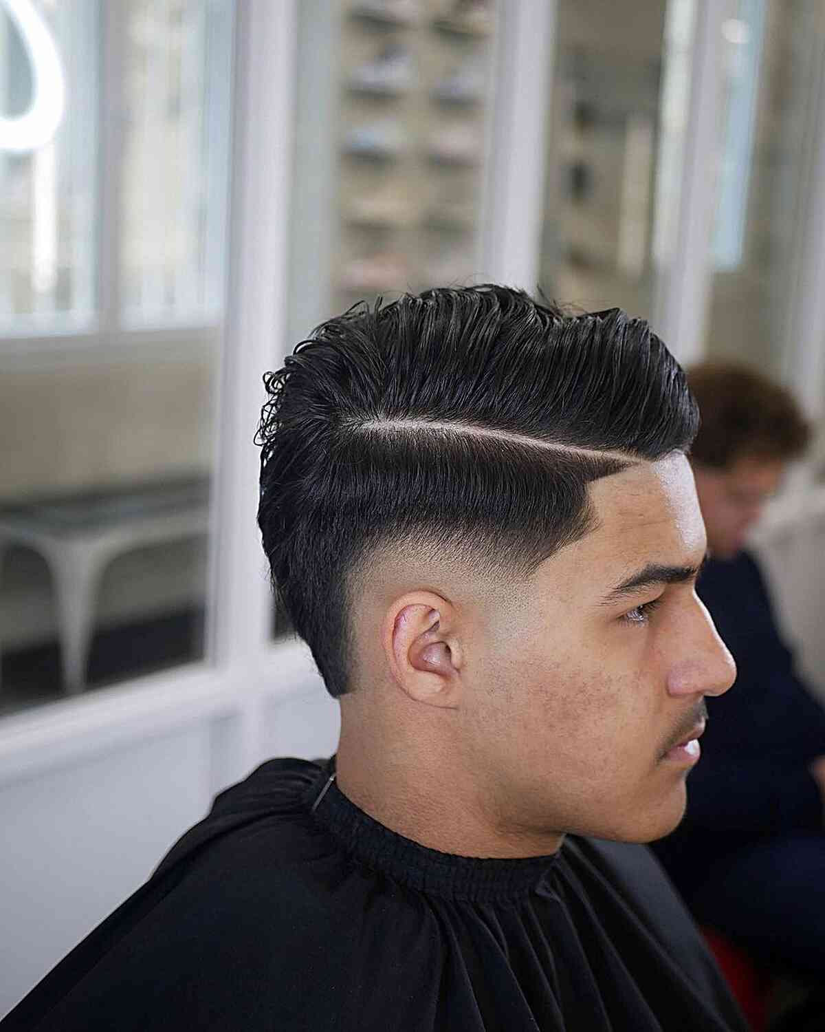 Mohawk Fade with a Very Hard Part for Men with thick hair