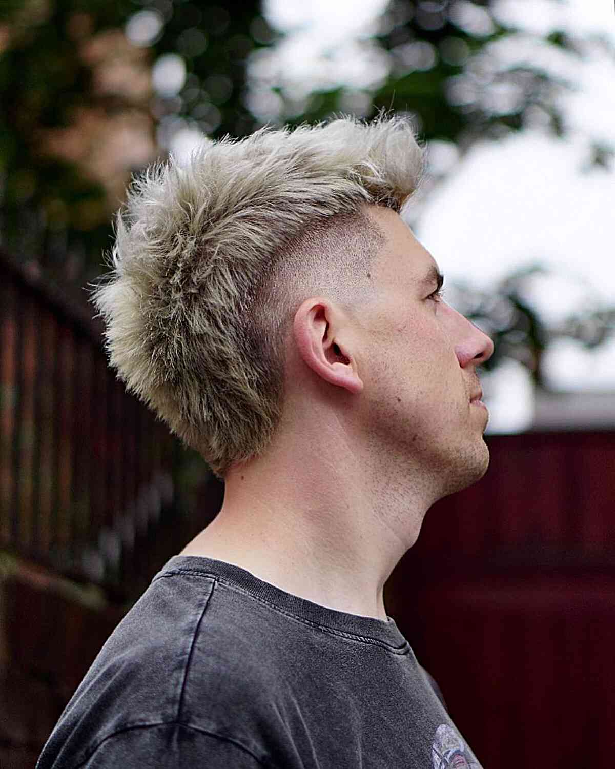 Mohawk Fade with Blonde hair Coloring for men