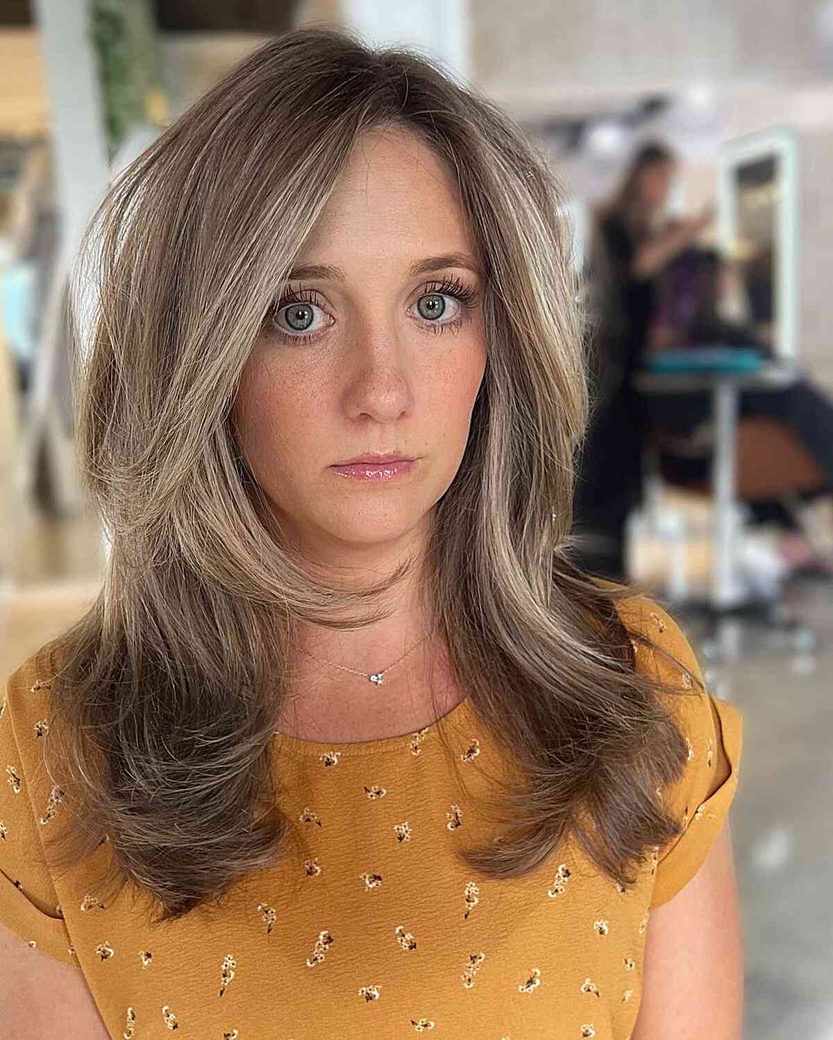 Breathtaking Mid-Length Face-Framing Layers for Oval Faces