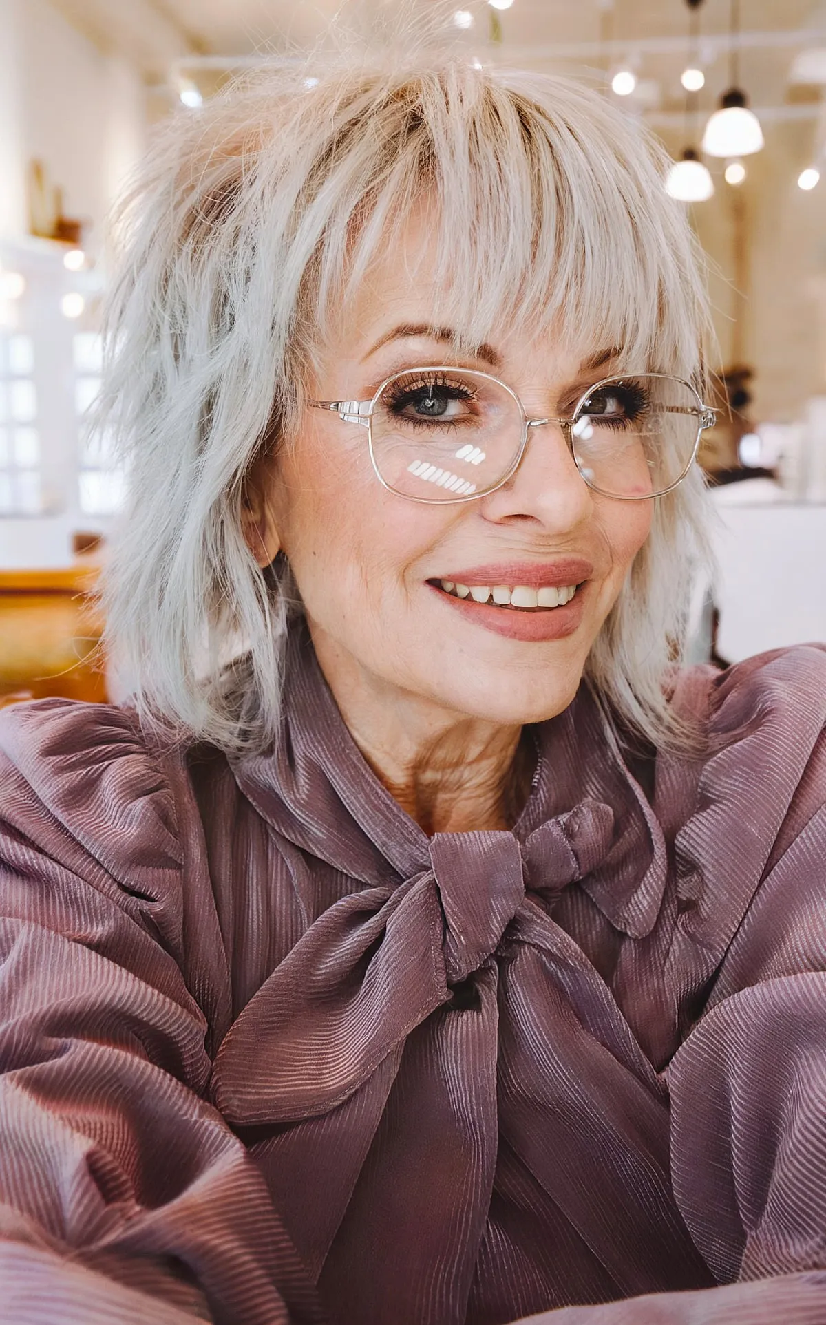 1970s Shag with Soft Bangs for Women Over 70 with Short Straight Hair