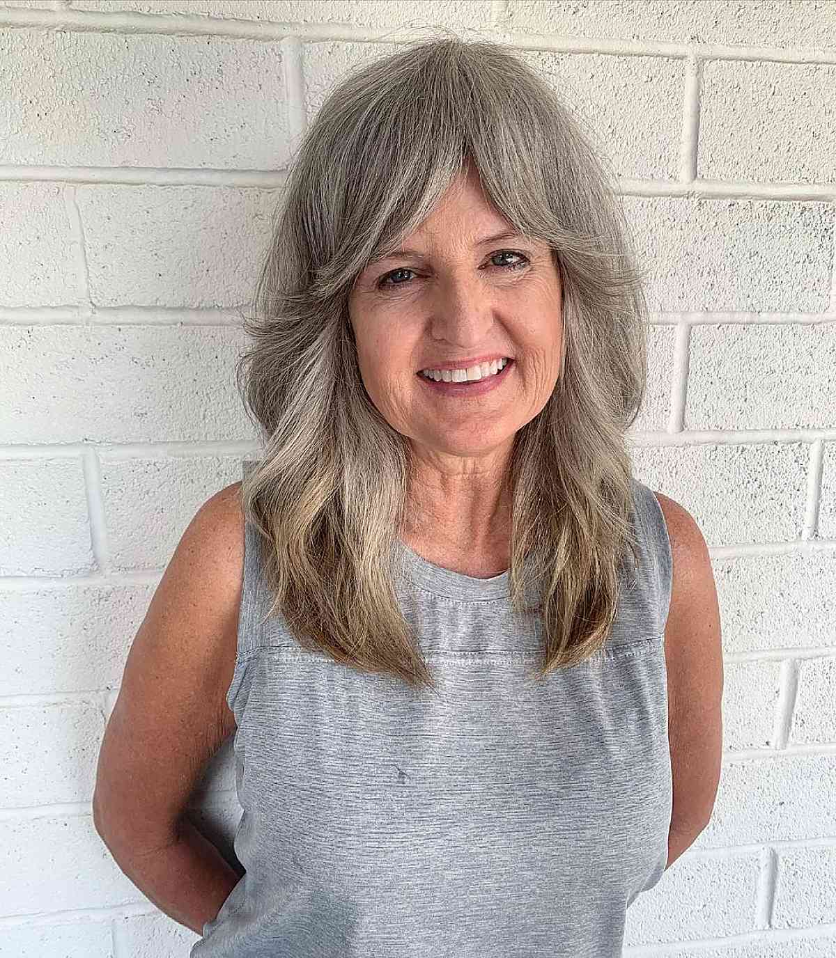 Medium-length shag hairstyle for women over 50