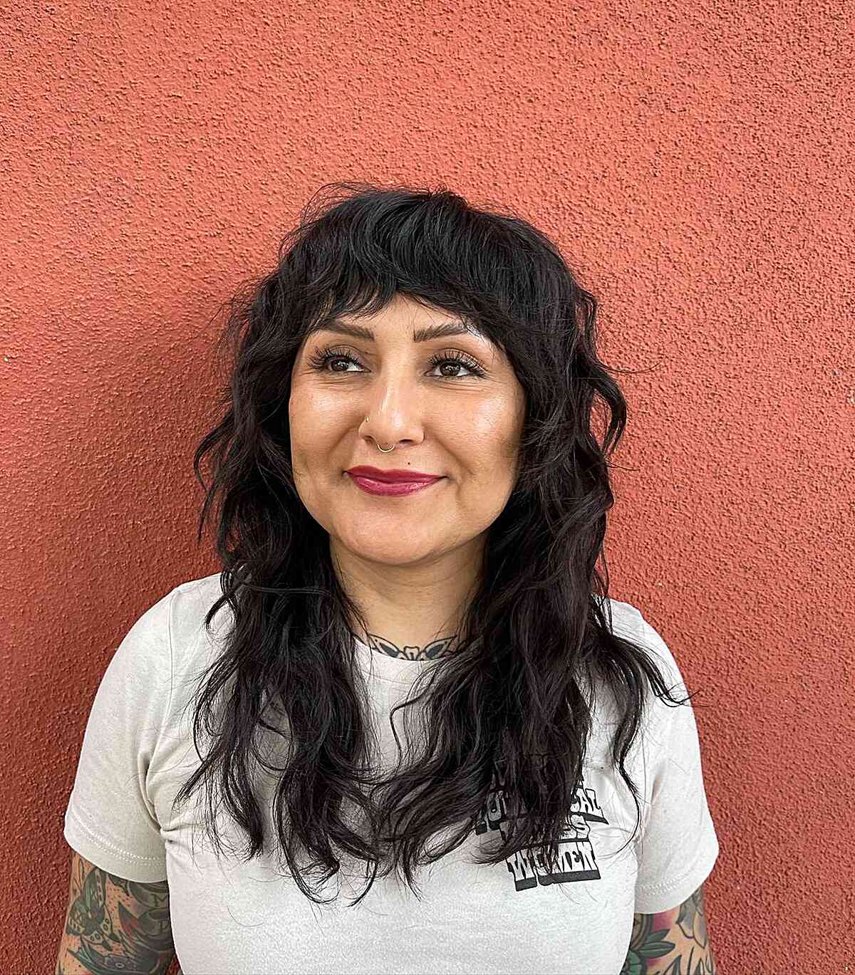 Layered Mid-Length Adorable Shag Hairstyle with Bangs for women with thinning hair