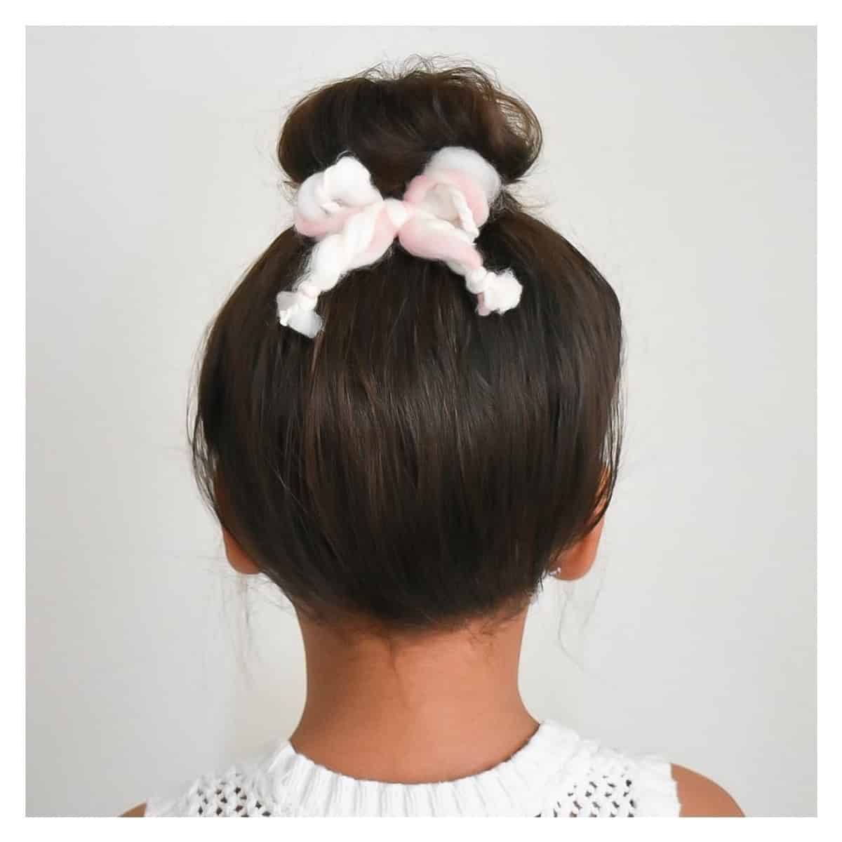 Adorable short top knot style for little ones