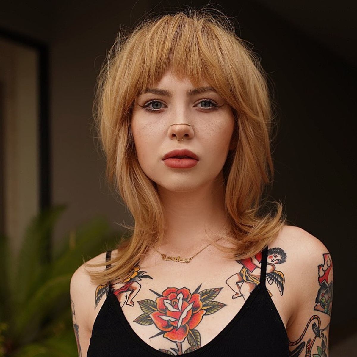 An Incredible Shoulder-Length Shag with Full Bangs