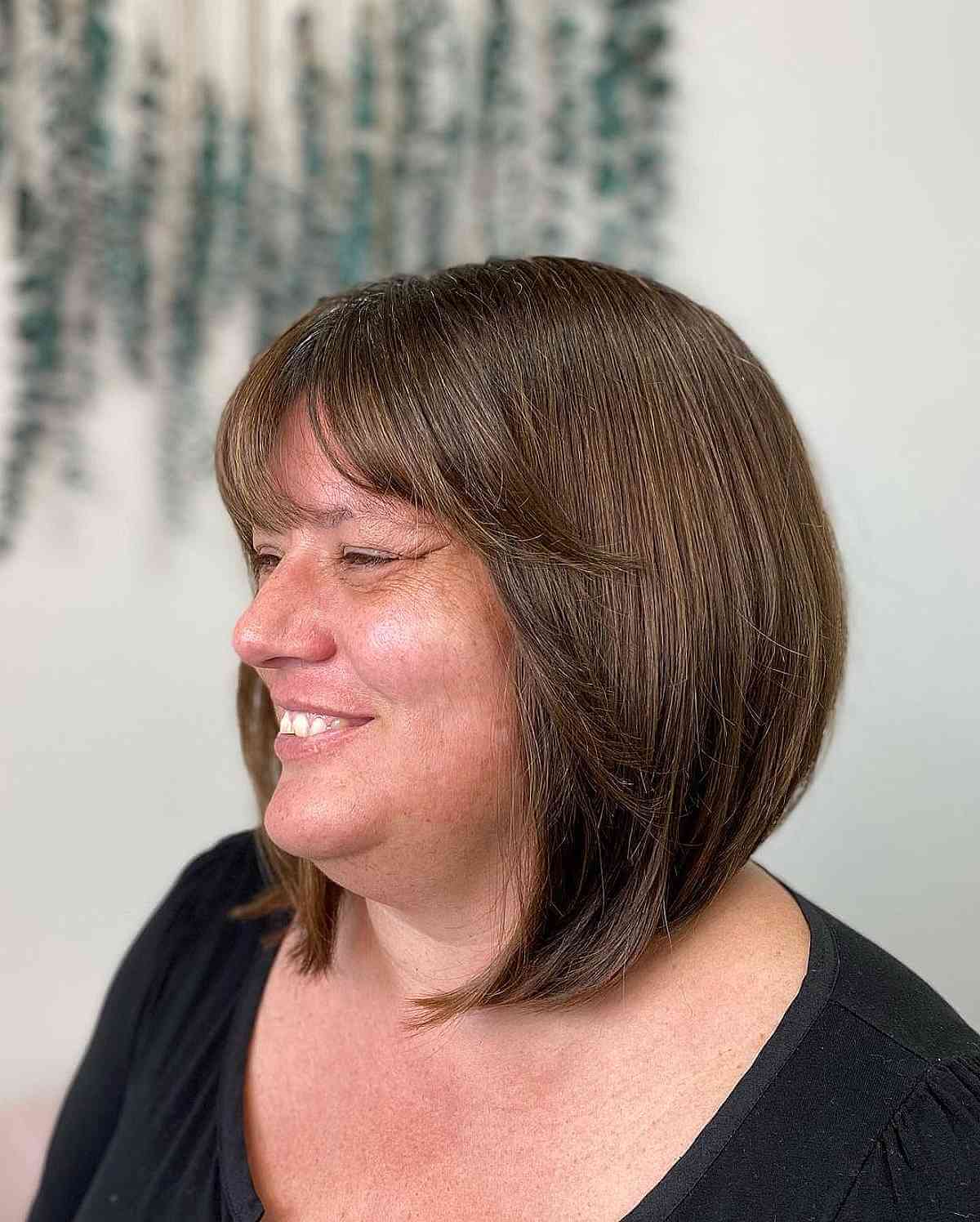 Angled Bob with Light Bangs for Women Over 40 with Fat Faces