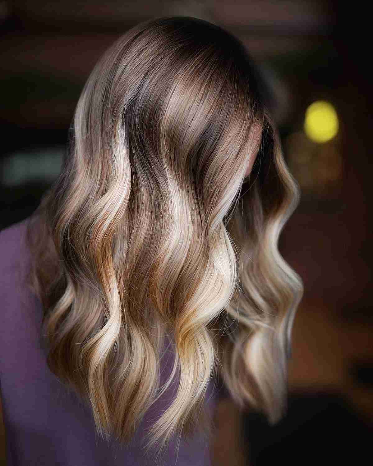 Artfully Crafted Ash Blonde Highlights on Deep Brown Hair