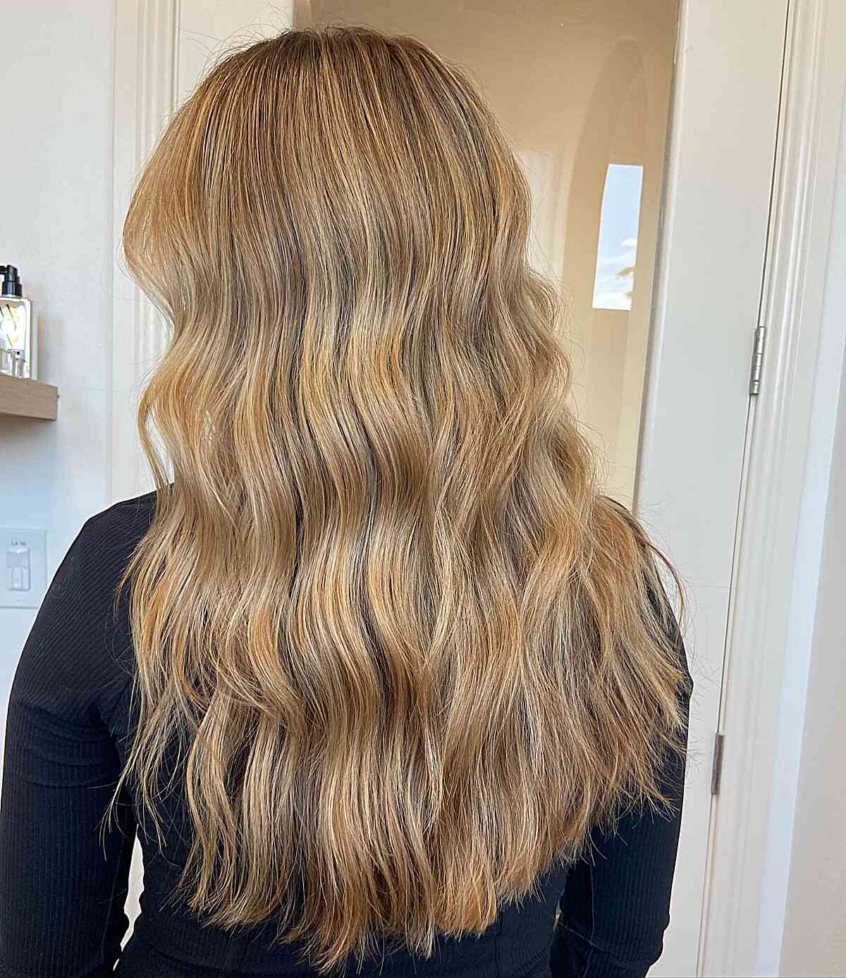 Ash Honey Blonde Highlights on Long Wavy Hair
