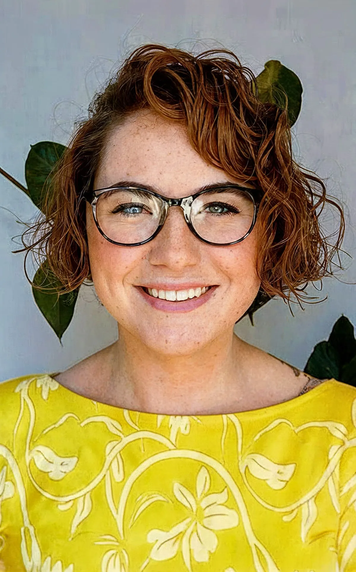 Stylish Asymmetrical Cheek-Length Curly Pixie Bob with Deep Side Part