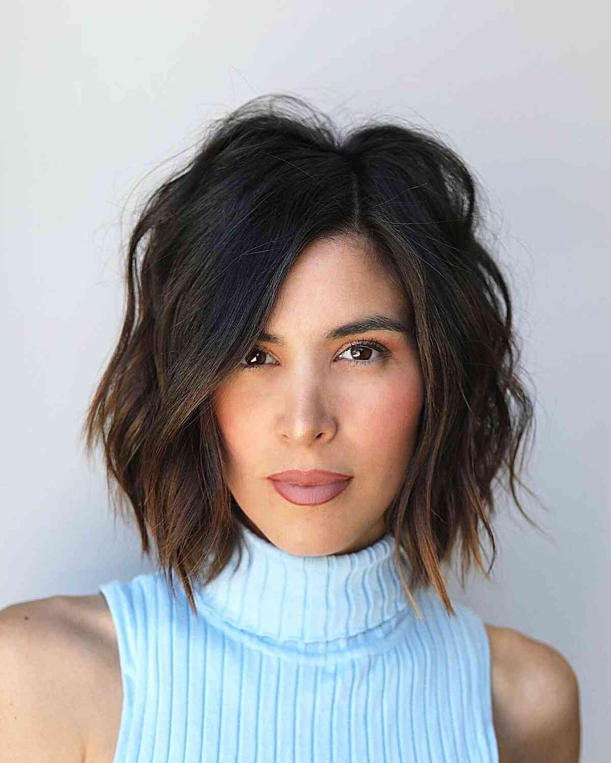 Asymmetrical Parting on a Wispy Above-the-Shoulder Bob
