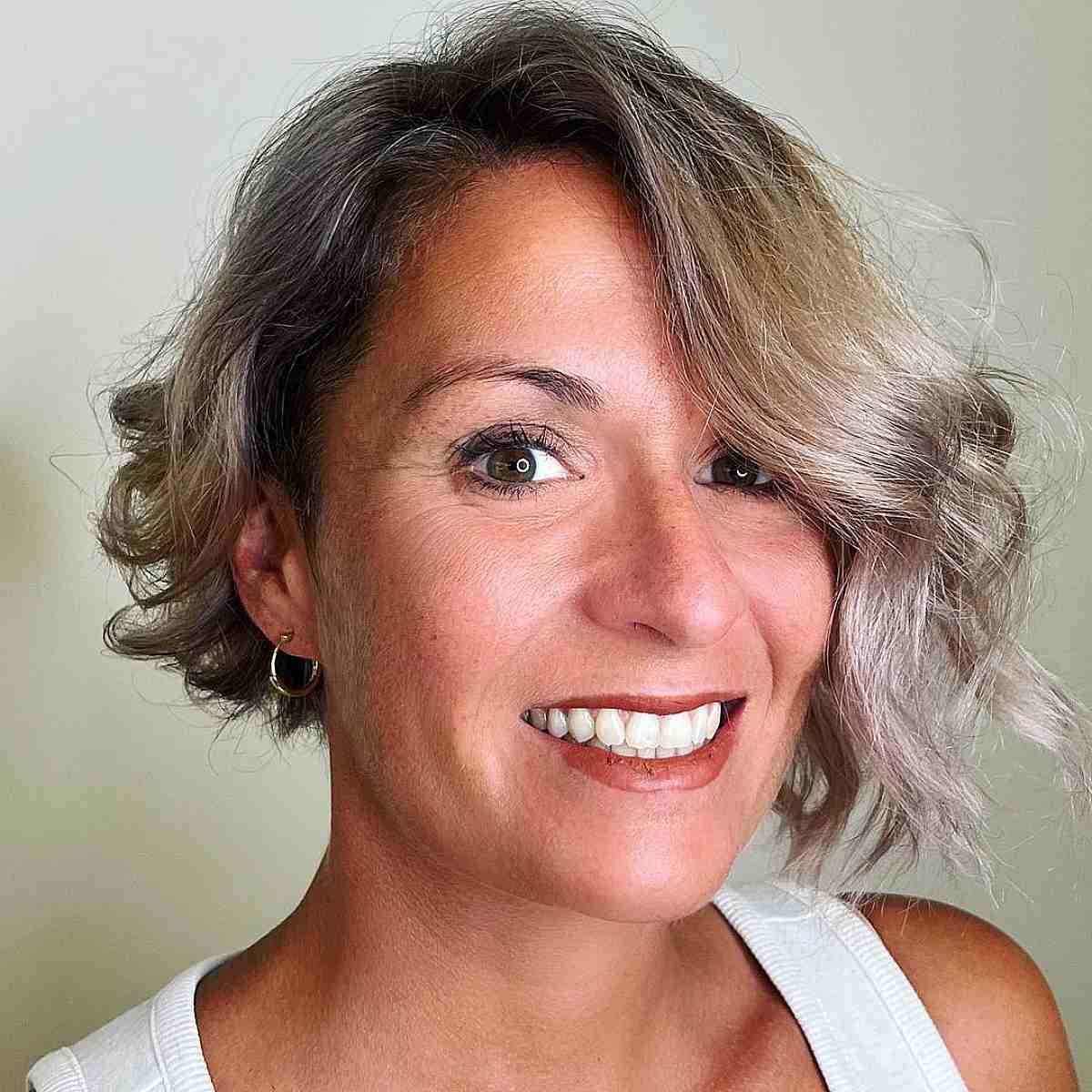 Asymmetrical Short Bob with Side Part and Waves