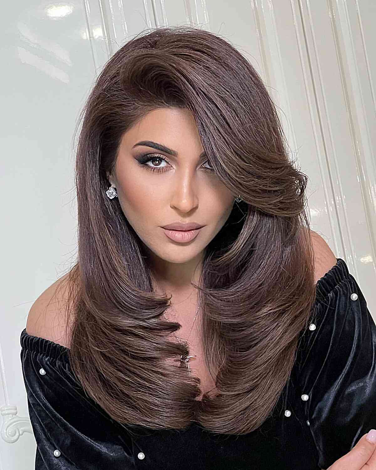 Beautiful Long Layers on Long Brunette Thick Hair for women with a deep side part