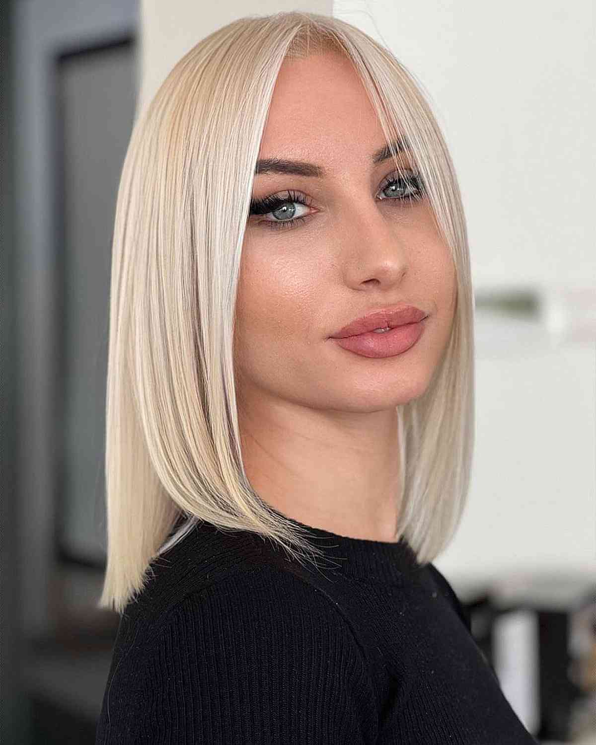 Beautiful sleek blonde hairstyle shoulder length