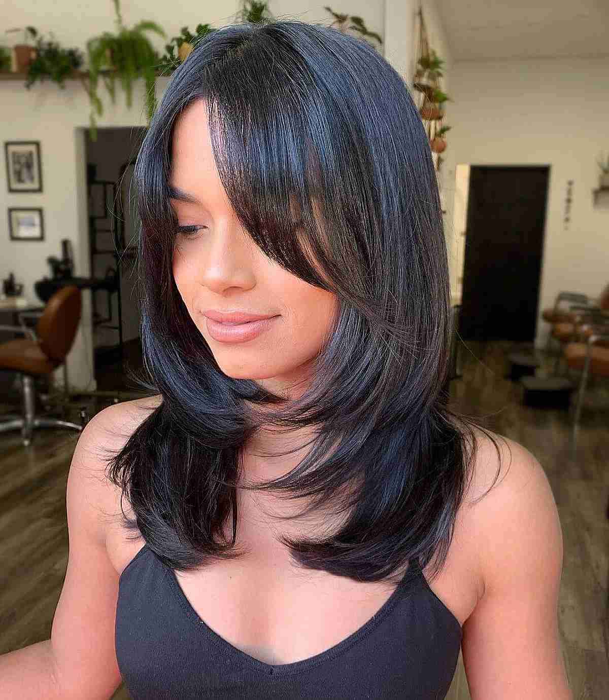 Beautiful Sleek Medium Layered Hairstyle with Extended Side Bangs