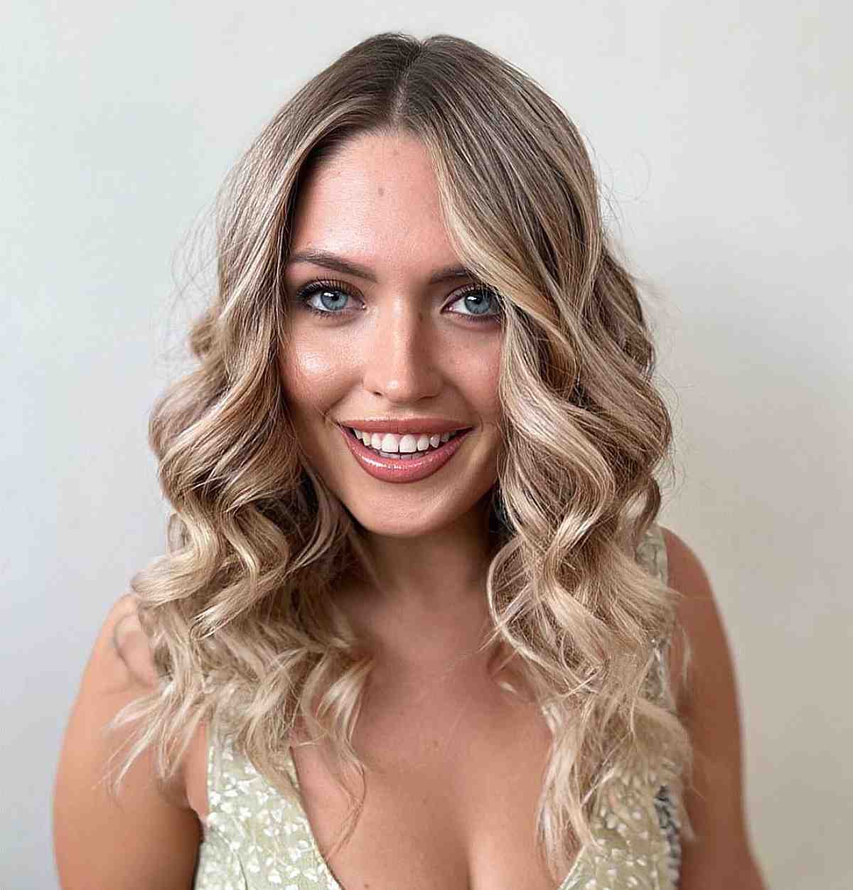 Beautifully Curled Medium-Length Hair