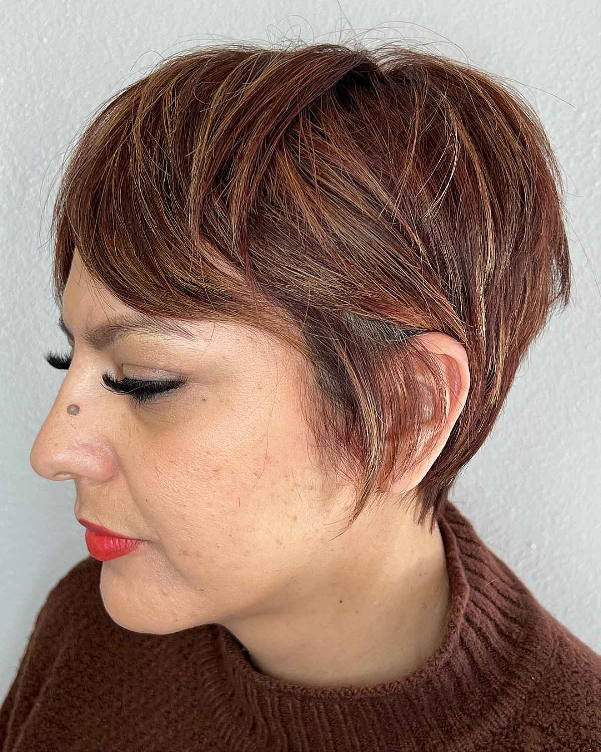 Bixie Cut Featuring a Fringe and Short Layers