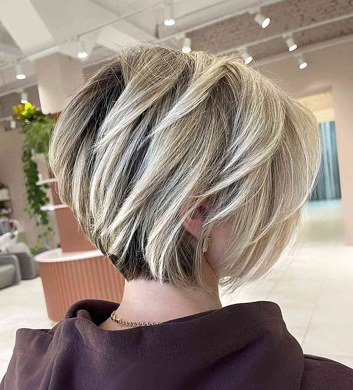 Long Bixie with Light Blonde Highlights and Dark Roots