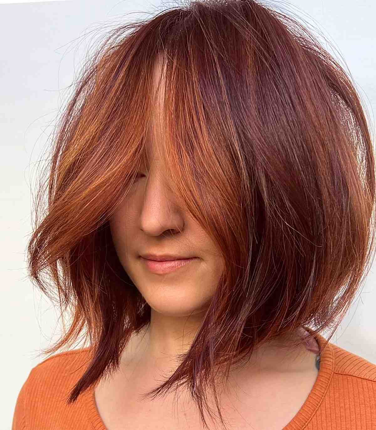 Blended Copper and Red Blunt Hairstyle