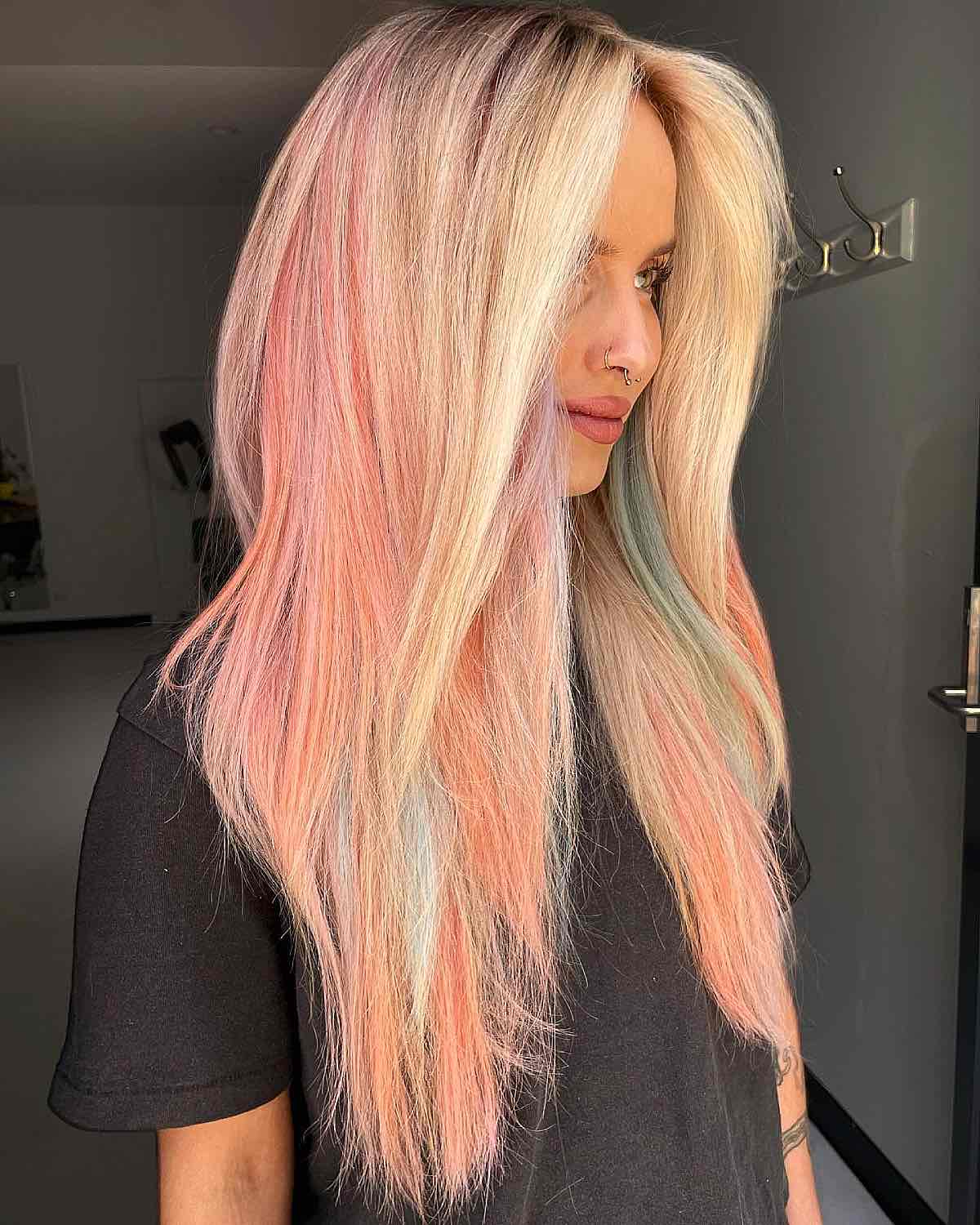 Blonde Hair Enhanced with Pastel Peach and Blue Accents