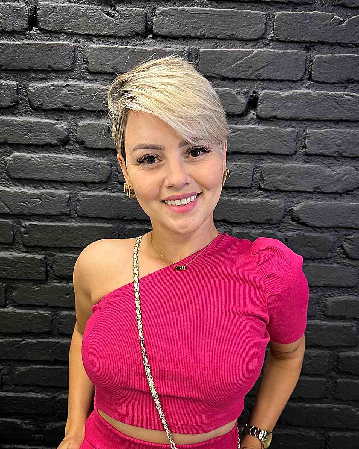 Blonde Pixie with Rooted Color and Swept Bangs for Oval Faces