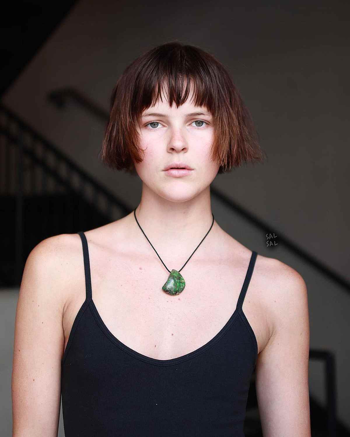 Blunt Ear-Length Cut with Textured Fringe for ladies with brown hair