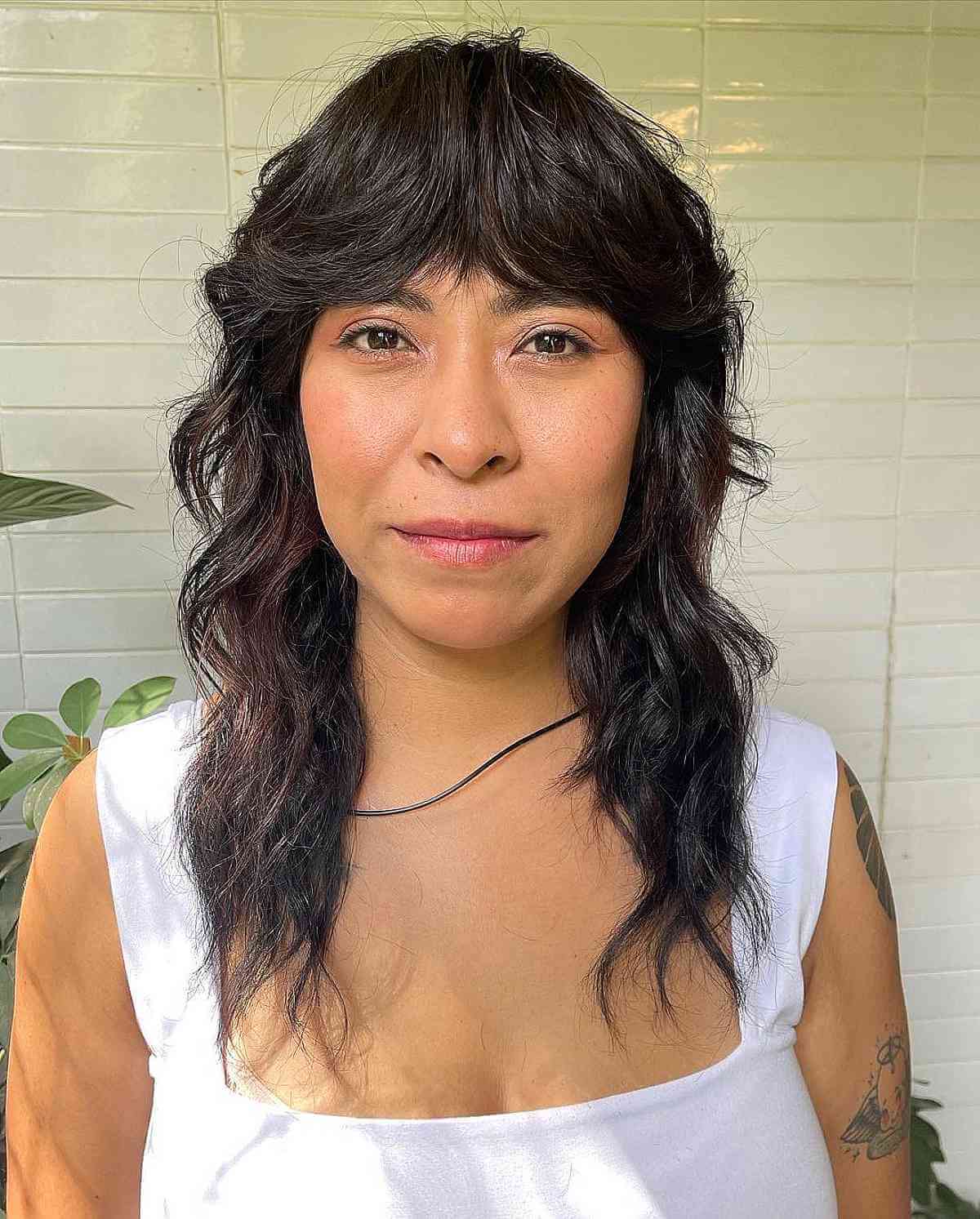 Bold Fringe on a Shaggy Cut for 40-Year-Old Ladies